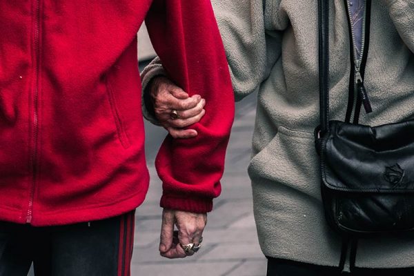 Elderly couple walking