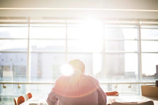 Man sitting alone in office
