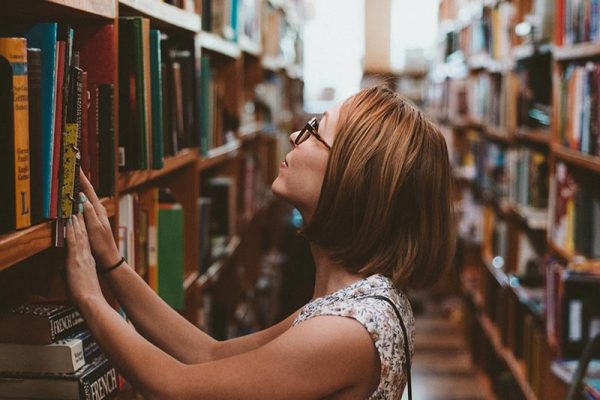 Student in college library