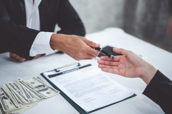 Signing Business Loan Contract | Spring Law